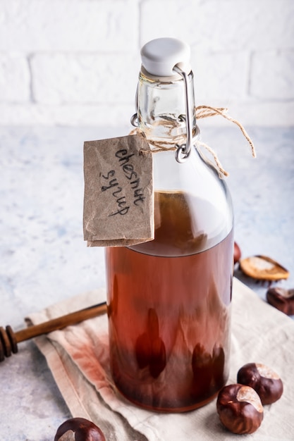 Homemade chestnut syrup in bottle 