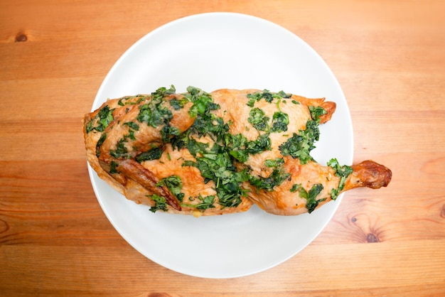 Homemade chicken rotisserie with spices closeup