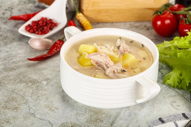 Photo homemade chicken soup with vegetables