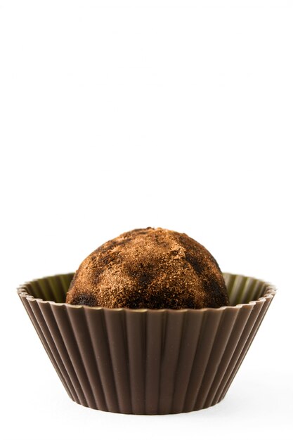 Homemade chocolate truffle isolated on white background