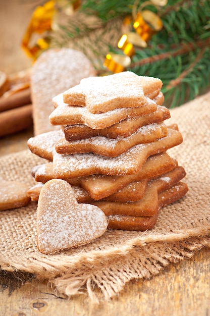 Homemade Christmas cookies sprinkled with powdered sugar