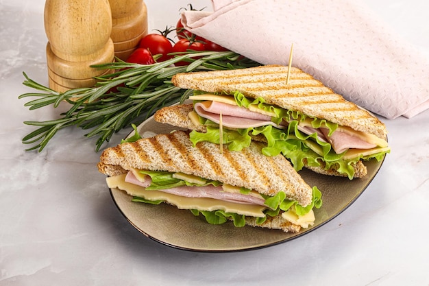 Homemade club sandwich with ham salad and cheese