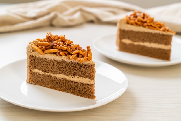 homemade coffee almonds cake on white plate