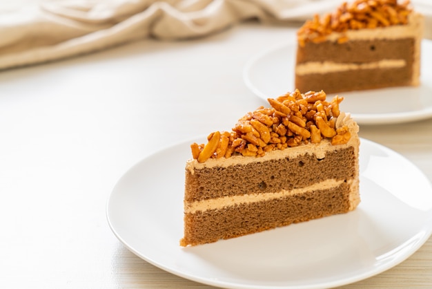 homemade coffee almonds cake on white plate