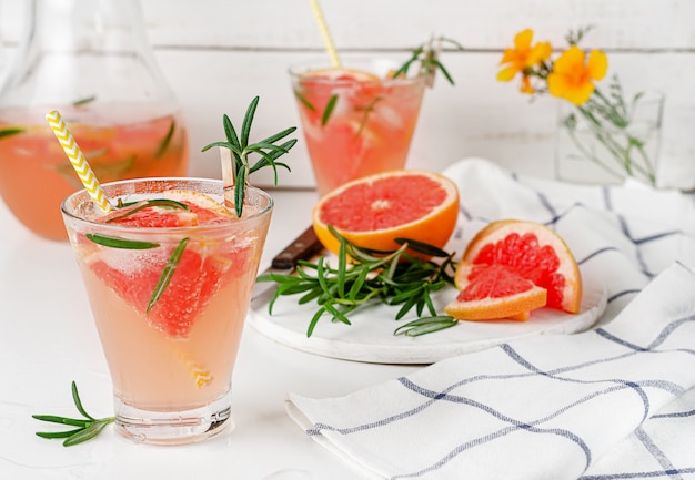 Homemade cold lemonade of grapefruit and rosemary. Antioxidant drink