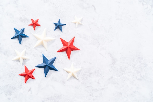 Homemade color chocolate stars that are made from color chocolate molds.