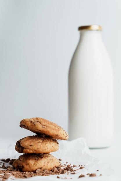 Homemade cookies on the background of a bottle of milk