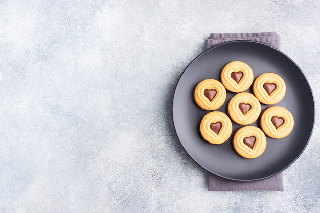 Homemade cookies in the shape of hearts on the plate