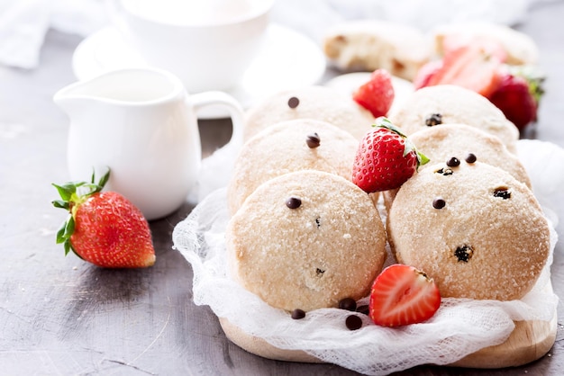 Homemade cookies on wooden board Fresh strawberry