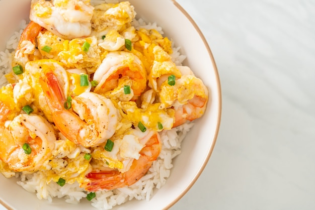 homemade creamy omelet with shrimps rice bowl