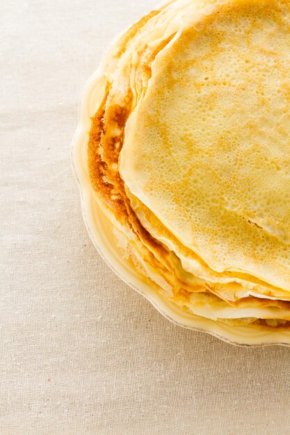 Homemade crepes with fresh raspberries and blueberries.