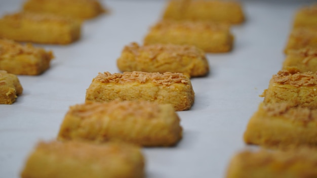 homemade crispy kaastengels cookies isolated on white background