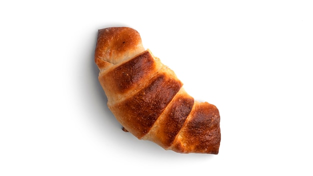 Homemade croissant isolated on a white background