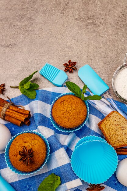 Homemade cupcakes with cinnamon star anise and fresh mint