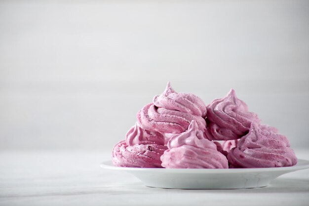 Homemade delicate berry marshmallows on a white plate homemade healthy sweets