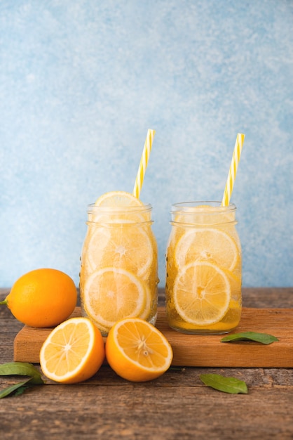 Homemade detox water with lemon in a glass jar