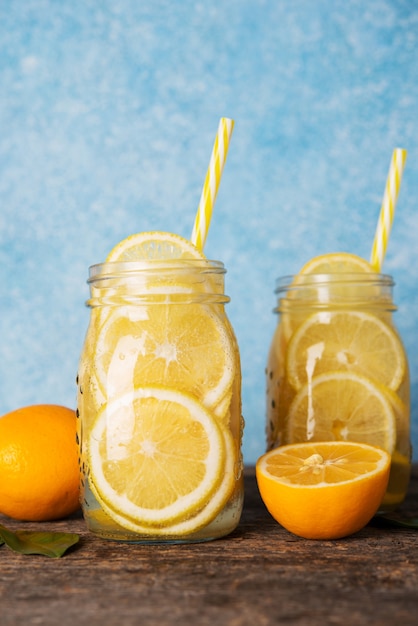 Homemade detox water with lemon in a glass jar