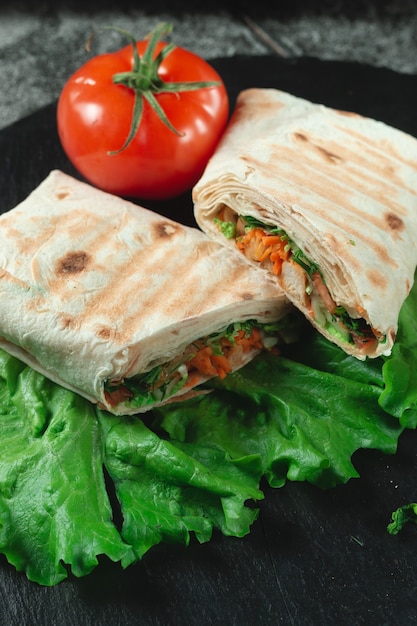 Homemade diet fresh shawarma with greens, chicken breast and tomatoes