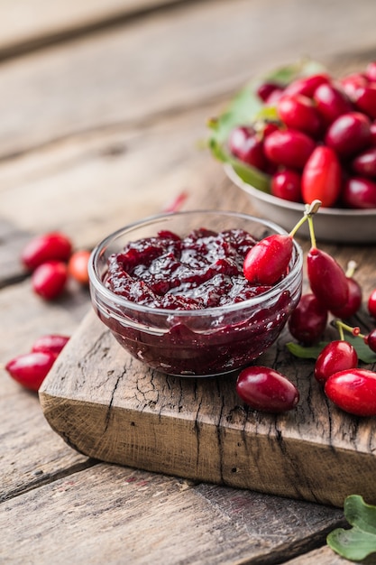 Homemade dogwood cornel jam in glass jar