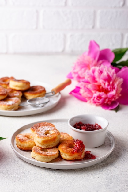 Homemade donuts with rose jam