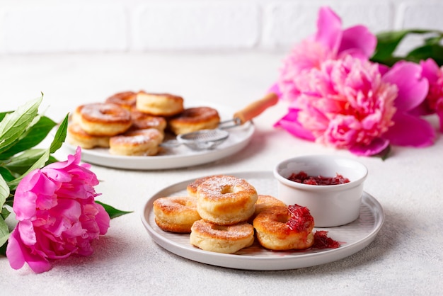 Homemade donuts with rose jam