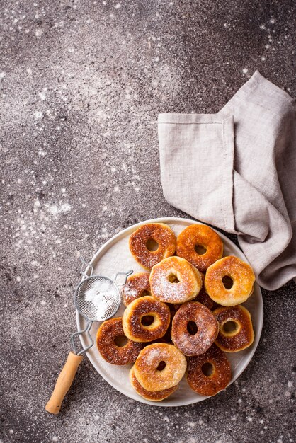 Homemade donuts with sugar powder