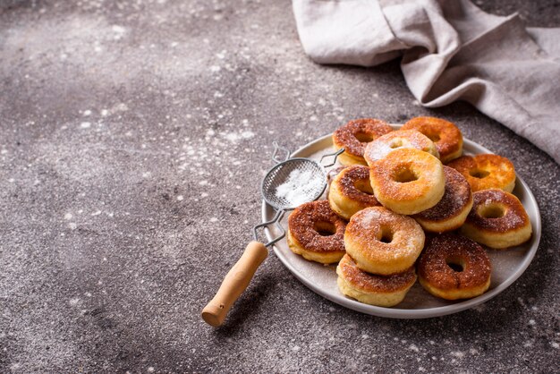 Homemade donuts with sugar powder