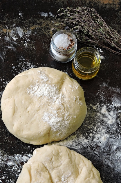 Homemade dough for bread or pizza. Italian pastries.