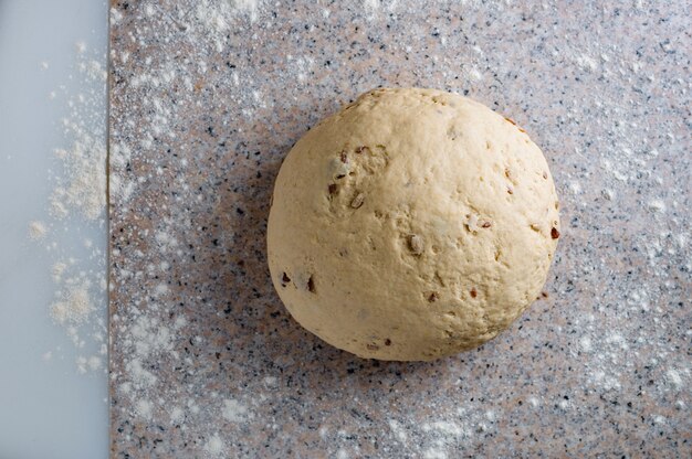 Homemade dough, semisweet dough with raisins, honey and  various seeds