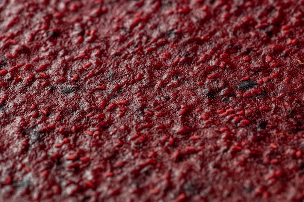 Homemade dried red fruits leather that needs to be rolled before serving on table for guests or taking away to storeroom