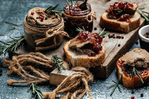 Homemade duck liver pate with red onion jam Gourmet appetizers Assorted Italian appetizer bruschetta banner menu recipe place for text top view