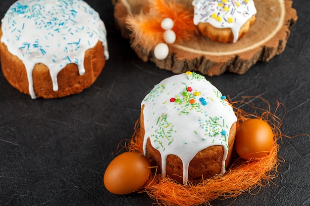 Homemade Easter cake and painted eggs on the table