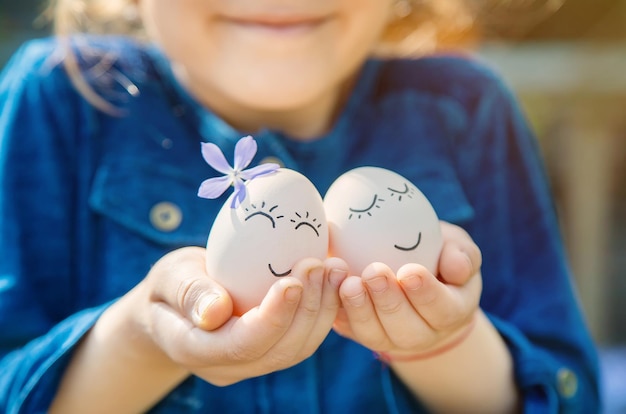 Homemade eggs with beautiful faces and a smile Selective focus