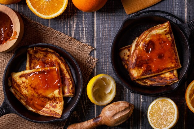 Homemade french crepes with orange syrup