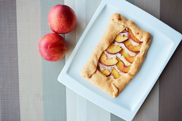 Homemade french Galeta with peaches