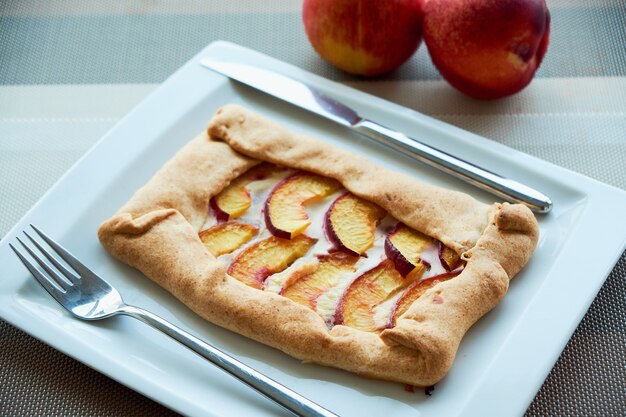 Homemade french Galeta with peaches