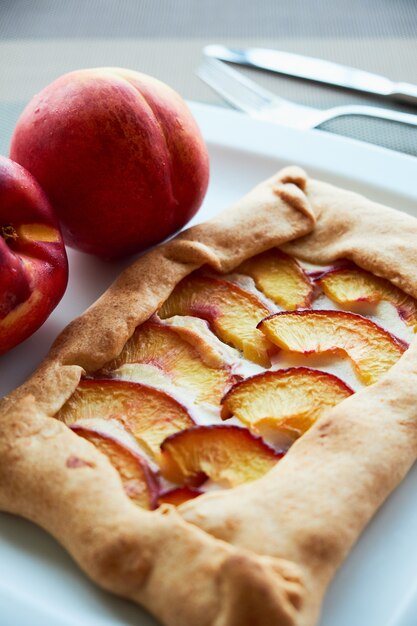 Homemade french Galeta with peaches