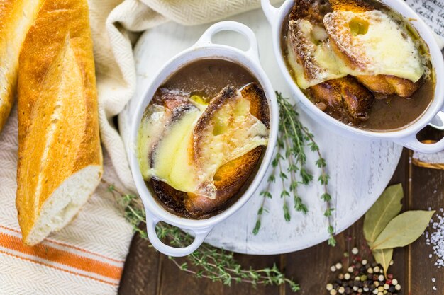 Homemade French onion soup with toasted baguette.