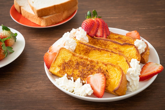 homemade french toast with fresh strawberry and whipping cream