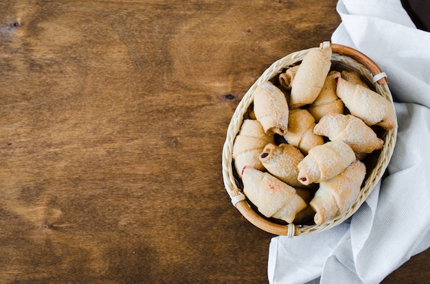 Homemade fresh baked croissants with jam filling for breakfast or snack.