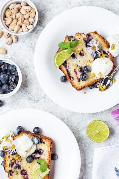 Homemade fresh blueberry butter cake with lime and nuts