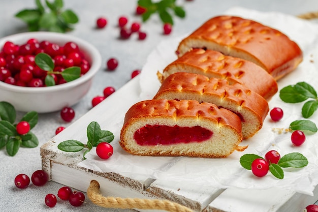 Homemade freshly baked pie with jelly and fresh organic cranberries