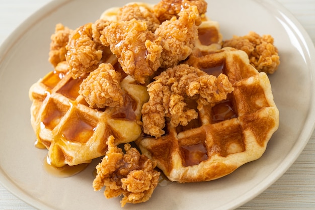 homemade fried chicken waffle with honey or maple syrup