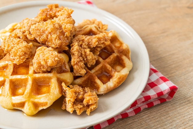 homemade fried chicken waffle with honey or maple syrup