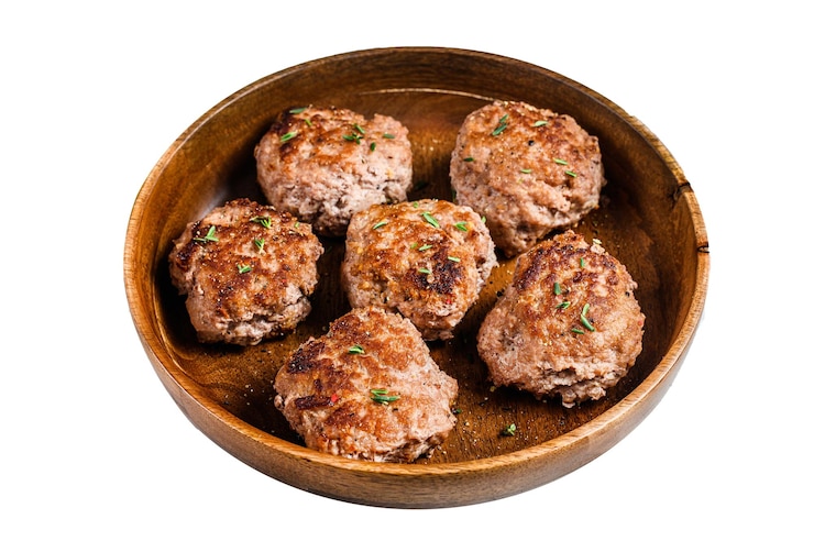 Photo homemade fried cutlets from beef and pork meat isolated on white background top view
