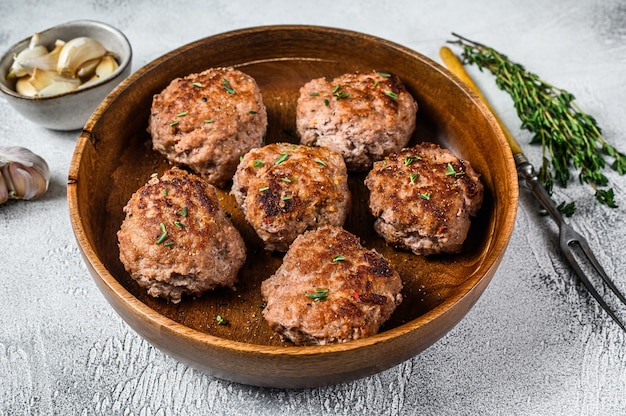 Homemade fried cutlets from beef and pork meat.