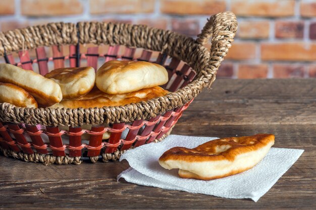 Homemade fried patties on wooden table