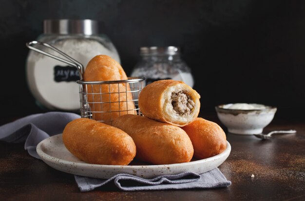 Homemade fried pies with liver and potatoes