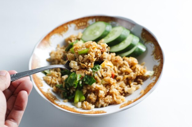 Homemade fried rice isolated on white background