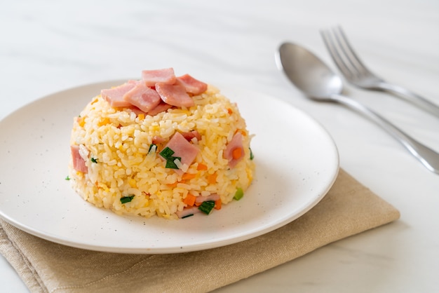 homemade fried rice with ham on plate